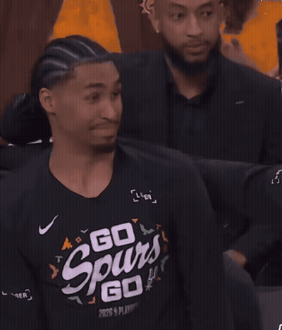 A Man Wearing A Black Shirt That Says Go GIF