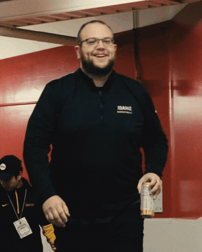 A Man Wearing A Black Shirt That Says Idaho GIF