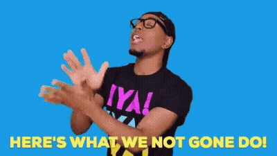 A Man Wearing A Black Shirt That Says Iya Is Clapping His Hands . GIF