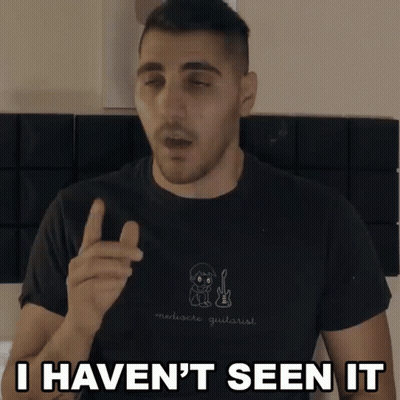 A Man Wearing A Black Shirt That Says Merluere Guitarist Says I Haven 'T Seen It GIF