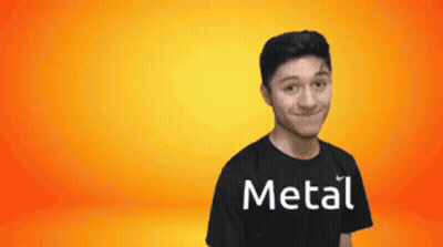 A Man Wearing A Black Shirt That Says Metal GIF