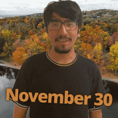 A Man Wearing A Black Shirt That Says November 30 On It GIF