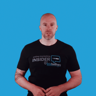 A Man Wearing A Black Shirt That Says Online Marketing Insider On It GIF