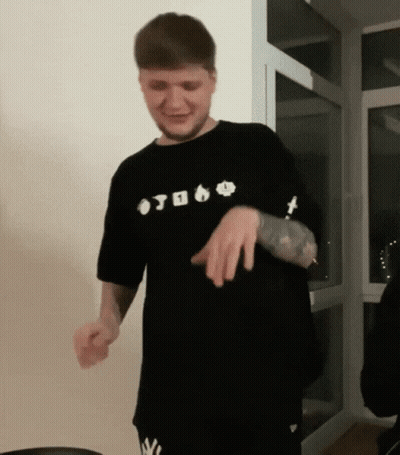 A Man Wearing A Black Shirt That Says ' Otoko ' On It Is Dancing GIF
