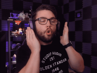A Man Wearing A Black Shirt That Says Studio Audio On It GIF