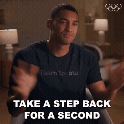 A Man Wearing A Black Shirt That Says Team Toyota GIF