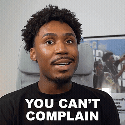 A Man Wearing A Black Shirt That Says " You Can 'T Complain " GIF