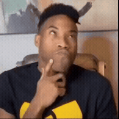 A Man Wearing A Black Shirt With A Yellow Wu Tang Logo On It Is Thinking About Something . GIF