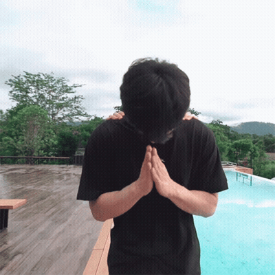 A Man Wearing A Black Shirt With The Letter A On The Front GIF