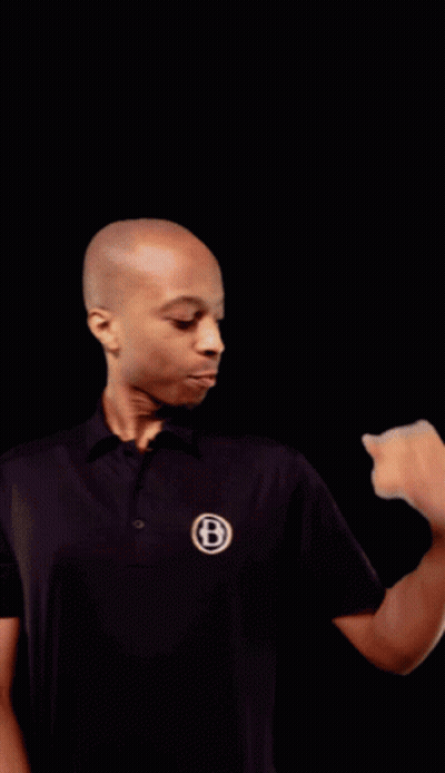 A Man Wearing A Black Shirt With The Letter B On It Flexes His Arm GIF