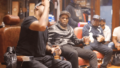 A Man Wearing A Black Shirt With The Number 16 On The Back GIF