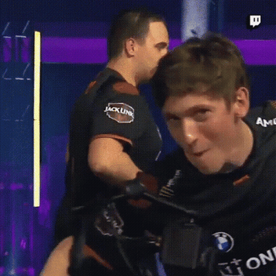 A Man Wearing A Black Shirt With The Word Amd On The Front GIF
