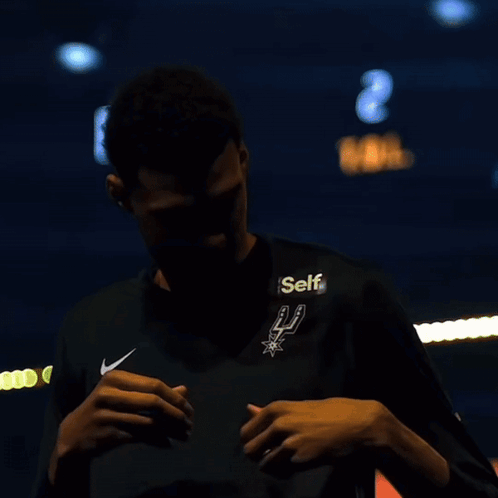 A Man Wearing A Black Shirt With The Word Self On The Front GIF