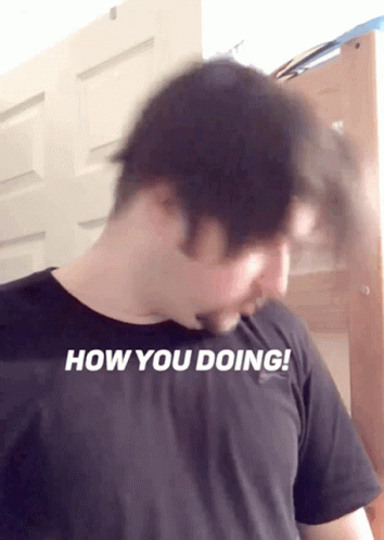 A Man Wearing A Black Shirt With The Words How You Doing On It GIF