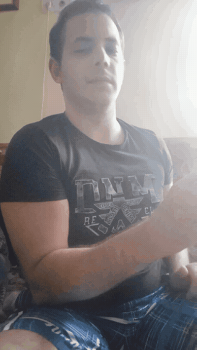 A Man Wearing A Black T-Shirt That Says Dna GIF