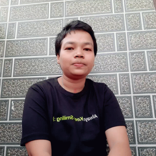 A Man Wearing A Black T-Shirt That Says " Grillima " On It GIF