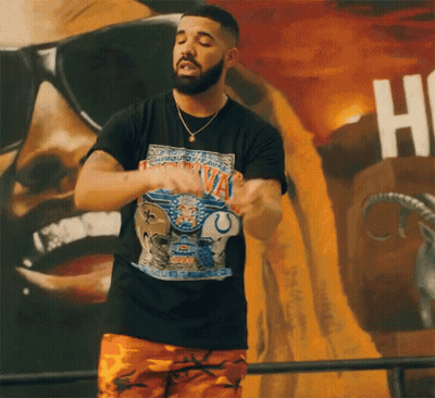 A Man Wearing A Black T-Shirt That Says ' Montana ' On It GIF