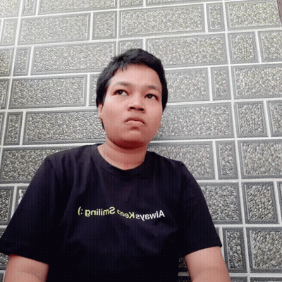 A Man Wearing A Black T-Shirt With The Letters Gnilm2 On It GIF