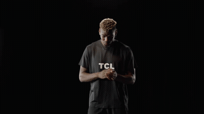 A Man Wearing A Black T-Shirt With The Word Tcl On It GIF
