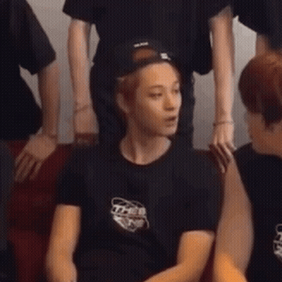A Man Wearing A Black T-Shirt With The Word Zen On It GIF