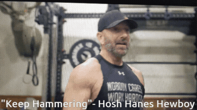A Man Wearing A Black Tank Top That Says Nobody Cares Work Harder GIF