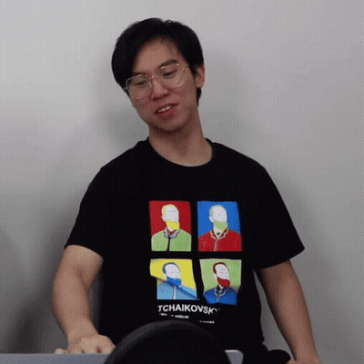 A Man Wearing A Black Tchaikovsky Shirt GIF