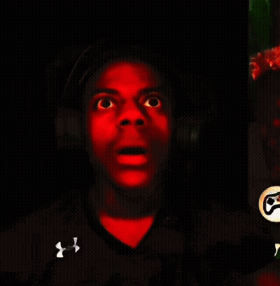 A Man Wearing A Black Under Armour Shirt Is Making A Funny Face GIF