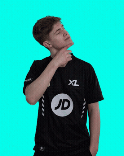 A Man Wearing A Black Xl Jd Shirt Holds His Hand To His Chin GIF