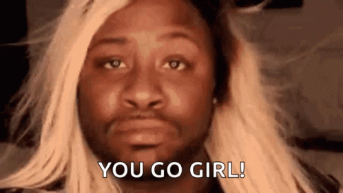 A Man Wearing A Blonde Wig Is Saying `` You Go Girl ! '' GIF