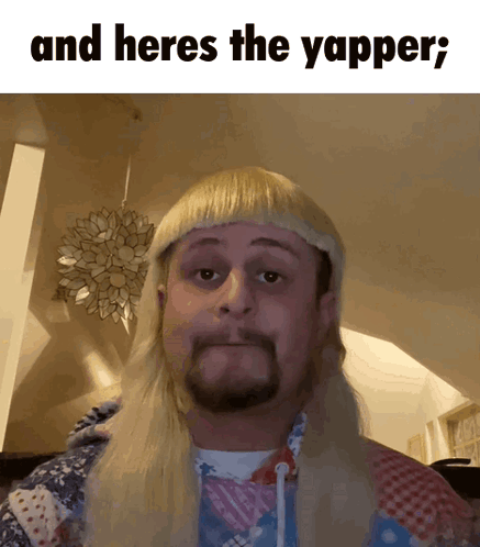 A Man Wearing A Blonde Wig With The Words And Heres The Yapper Written Below Him GIF
