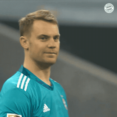 A Man Wearing A Blue Adidas Shirt Looks To The Side GIF
