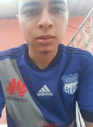 A Man Wearing A Blue Adidas Shirt With Huawei Written On The Sleeve GIF