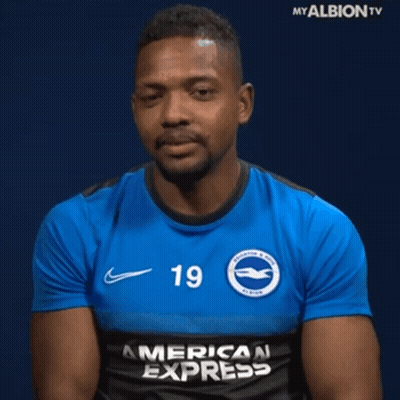 A Man Wearing A Blue American Express Shirt GIF