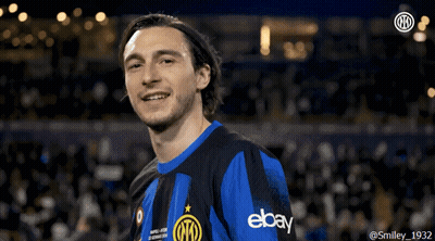 A Man Wearing A Blue And Black Shirt With Ebay On It GIF