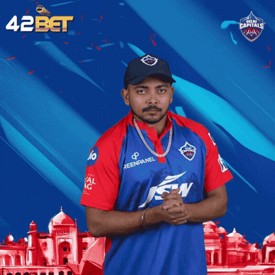 A Man Wearing A Blue And Red Jersey With The Word Delhi Carnival On It GIF