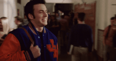 A Man Wearing A Blue And Red Varsity Jacket With The Letter J On It GIF