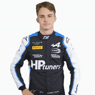 A Man Wearing A Blue And White Jacket With Hp Tuners On It GIF
