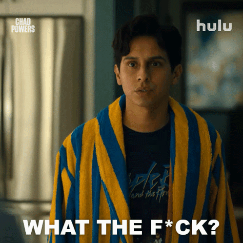 A Man Wearing A Blue And Yellow Striped Robe Is Asking What The F * Ck GIF