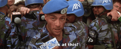 A Man Wearing A Blue Beret With An On It Says So Look At This GIF