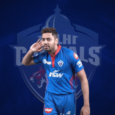 A Man Wearing A Blue Delhi Capitals Jersey GIF