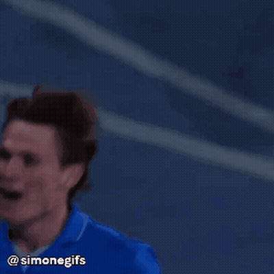 A Man Wearing A Blue Ea7 Msc Shirt Is Giving A Thumbs Up GIF