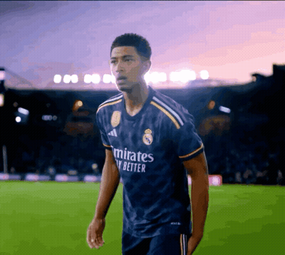 A Man Wearing A Blue Emirates Fly Better Jersey GIF