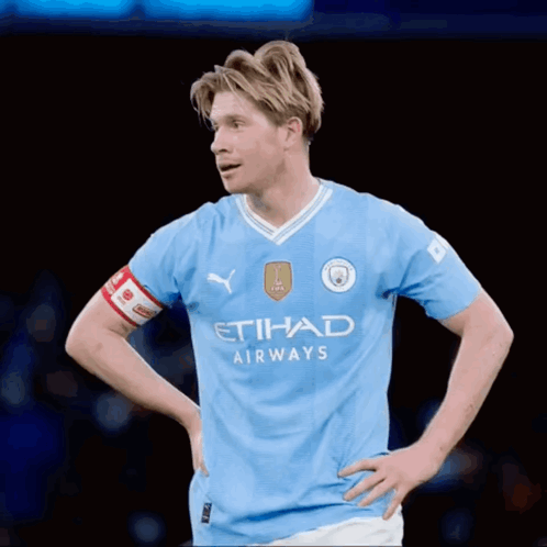 A Man Wearing A Blue Etihad Airways Jersey GIF