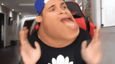 A Man Wearing A Blue Hat And A Black Shirt Is Making A Funny Face With His Mouth Open . GIF