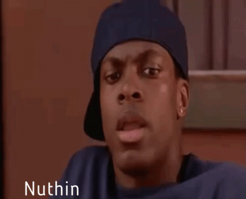 A Man Wearing A Blue Hat And A Blue Shirt Is Making A Funny Face And Says Nuthin . GIF
