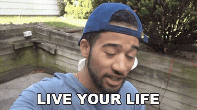A Man Wearing A Blue Hat And A Blue Shirt Says " Live Your Life " GIF