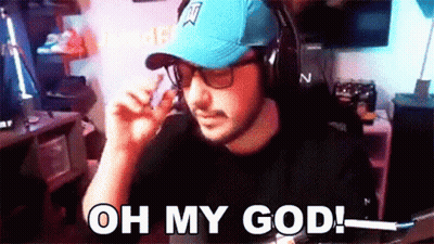 A Man Wearing A Blue Hat And Headphones Says Oh My God GIF