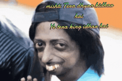 A Man Wearing A Blue Hat With The Words " Mishti Tera Dhyan Kidhan " On It GIF