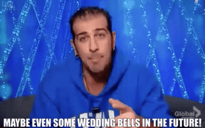 A Man Wearing A Blue Hoodie Says " Maybe Even Some Wedding Bells In The Future " GIF