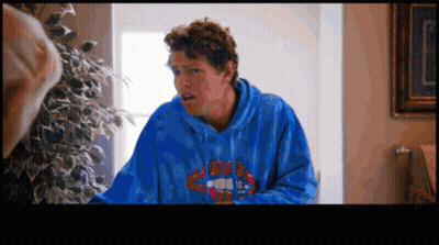 A Man Wearing A Blue Hoodie With Rolling Stones On The Front GIF